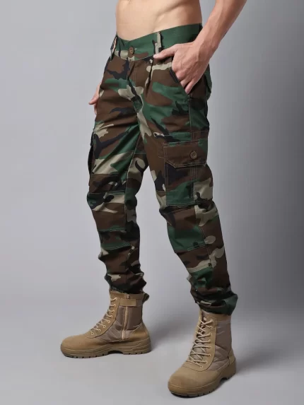 Woodland Waterproof Ripstop Tactical Pant with camouflage design, multiple pockets, and reinforced waterproof fabric ideal for rugged outdoor use.