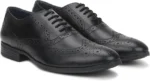 Brogue Shoe Bata in premium brown leather with classic wingtip design, ideal for men’s formal and business wear.