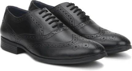 Brogue Shoe Bata in premium brown leather with classic wingtip design, ideal for men’s formal and business wear.