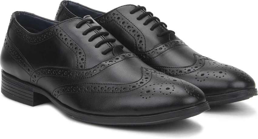 Brogue Shoe Bata in premium brown leather with classic wingtip design, ideal for men’s formal and business wear.